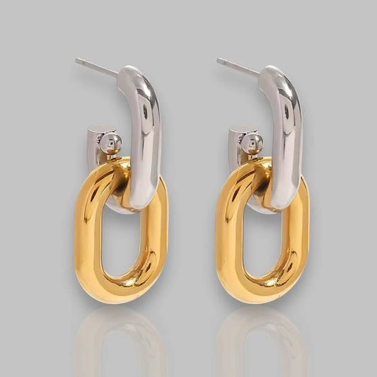 Elegante Ohrringe Zenobia in Silber und Gold für einen modernen Look, ideal für jeden Anlass.