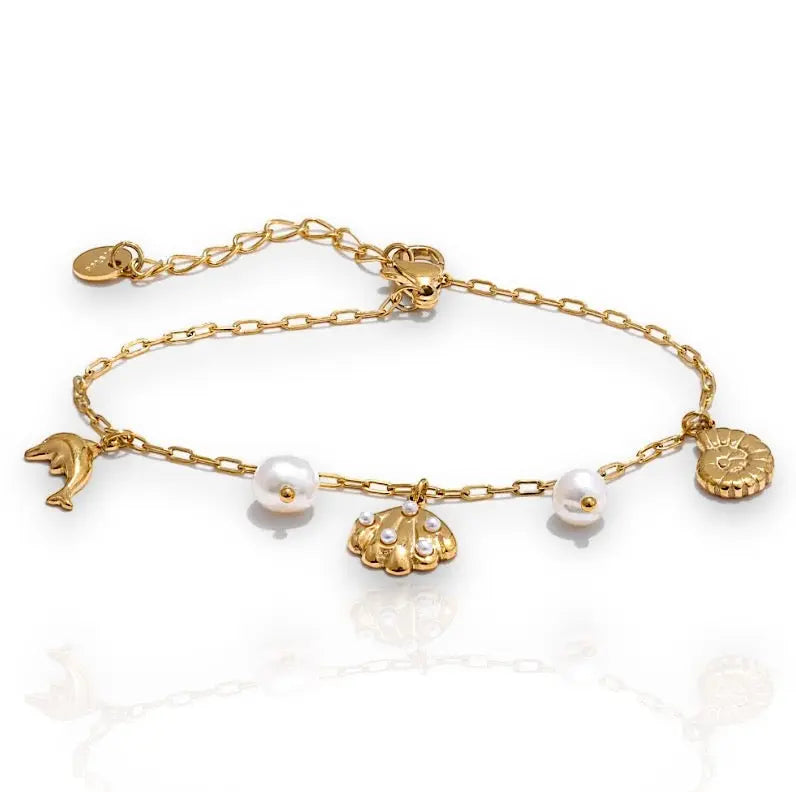 Zarte Xiomara-Armband mit Delfin, Muschel und Perlen, perfekt für jeden Anlass.