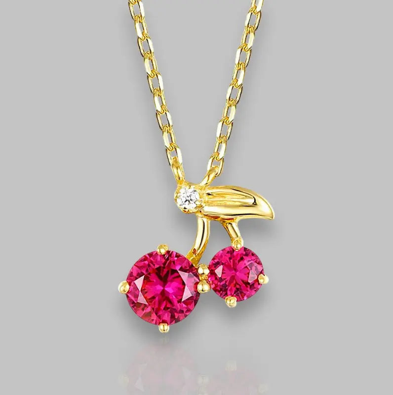 Elegante Cherry Bloom Halskette mit funkelnden rosa Steinen, perfekt für jeden Anlass und stilvolle Akzente.