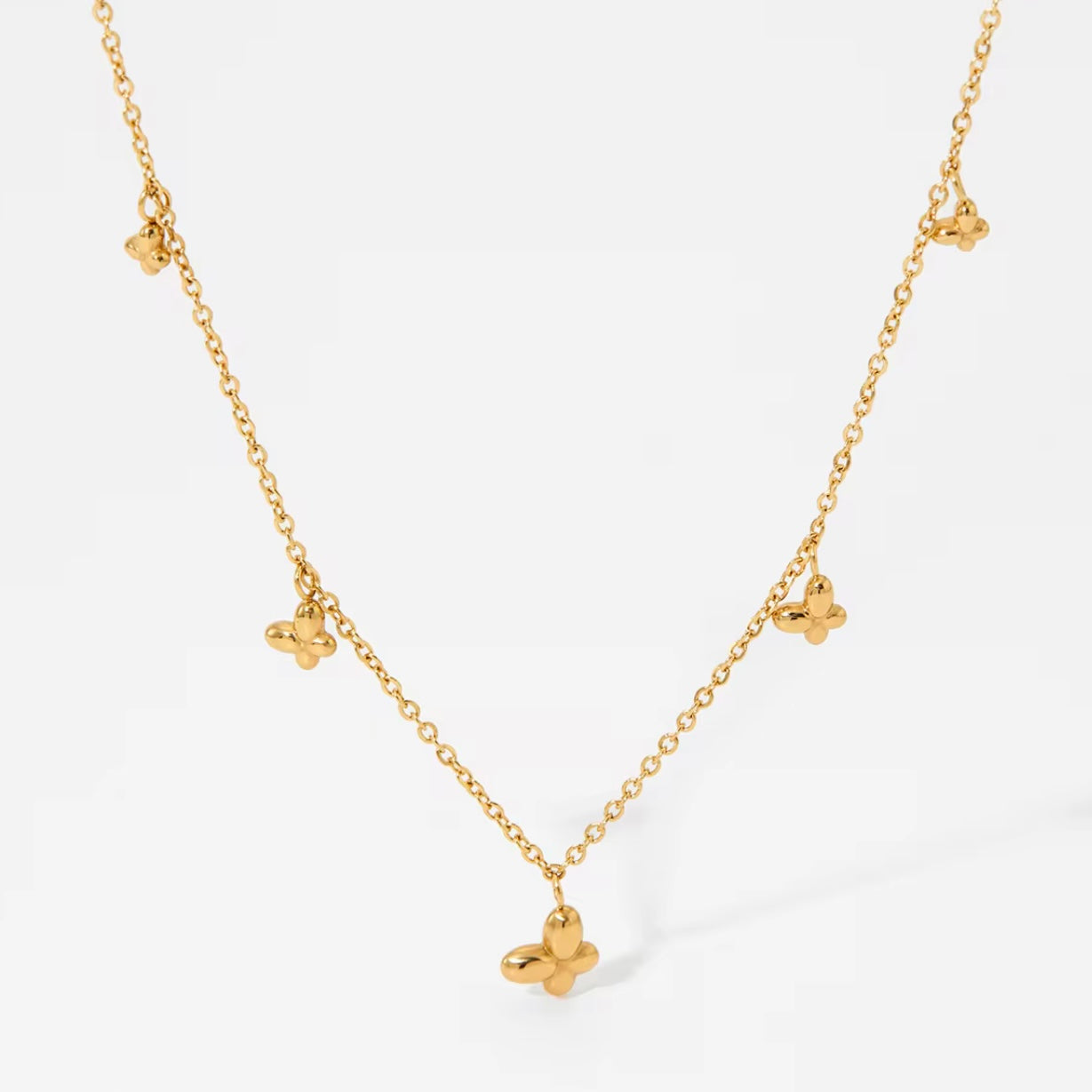 Lúmina Goldkette mit mehreren Blütenanhängern, elegantes Schmuckstück