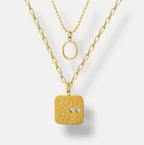 Goldene Bonded Hearts Halskette mit quadratischem Anhänger YOU & ME, zwei Herzen und ovalem Ringanhänger.